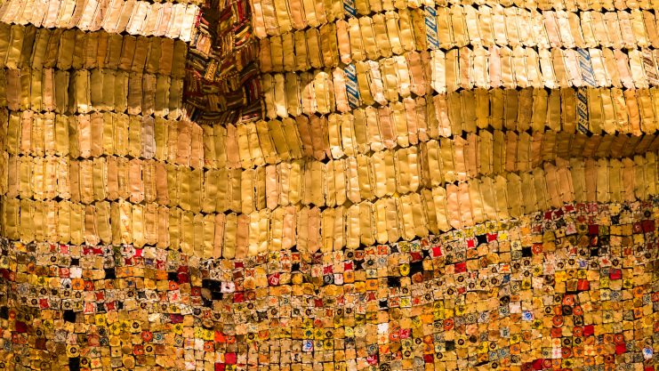 Between Earth and Heaven by El Anatsui. Fire